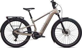 ベージュ色の電動アシスト自転車の全体像